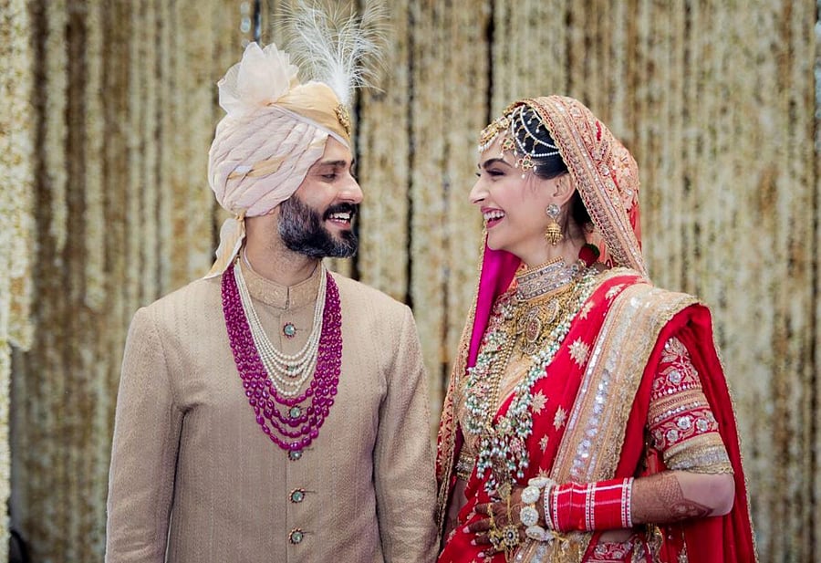 Bollywood actor Sonam Kapoor and Delhi businessman Anand Ahuja tied the knot in a traditional Sikh wedding, in Mumbai on Tuesday. PTI Photo
