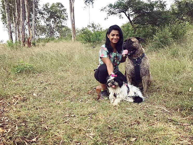 Madhurima Bhattacharjee with Bullmastiff Zorro and Shih Tzu Bella.