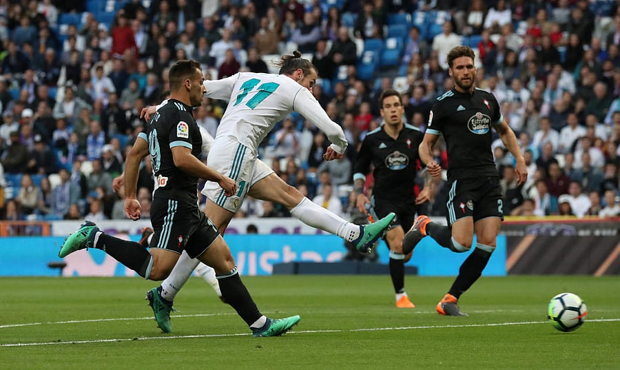 Real Madrid's Gareth Bale scores against Celta Vigo in La Liga on Saturday. Reuters.