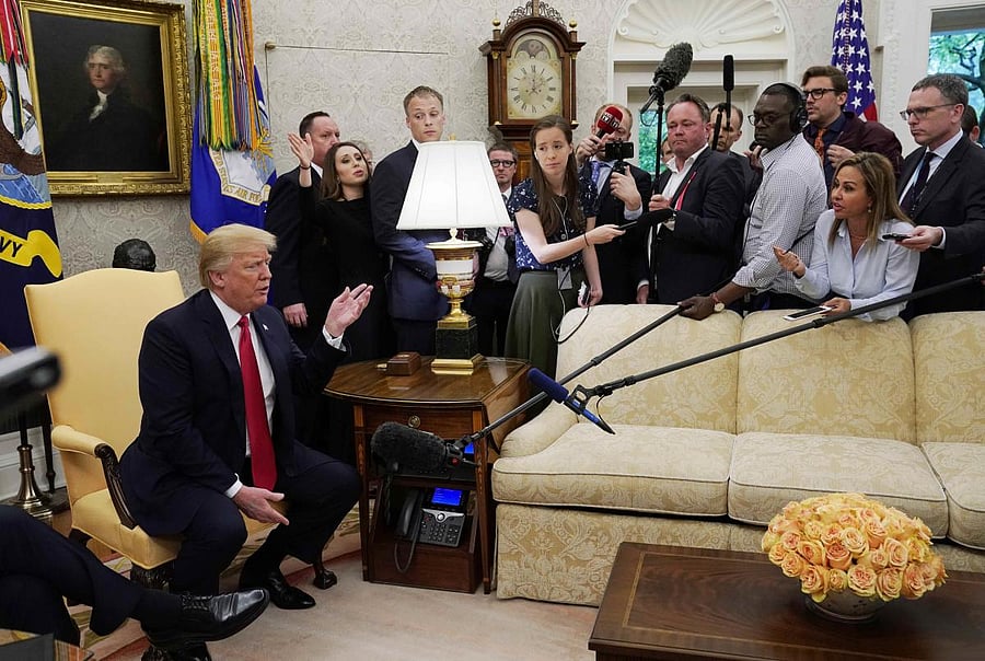 US President Donald Trump speaks to the news media as he meets with NATO Secretary General Jens Stoltenberg at the White House in Washington on Thursday. REUTERS