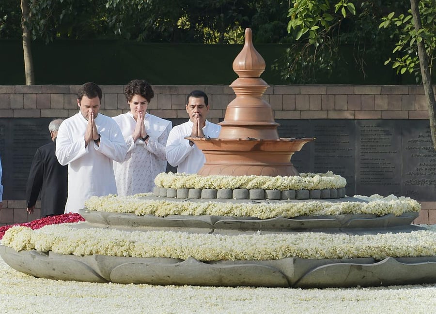 Congress President Rahul Gandhi with his sister Priyanka and her husband Robert Vadra pays tribute to former prime minister Rajiv Gandhi on his 27th death anniversary at his memorial 'Vir Bhumi' in New Delhi on Monday. PTI Photo