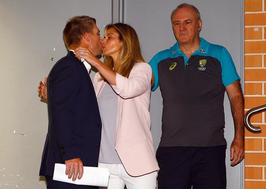 Former Australian cricket vice-captain David Warner kisses his wife Candice. AP/PTI