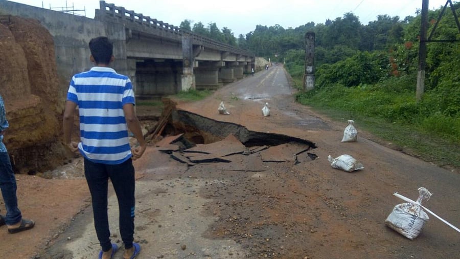 The connecting road to the Hosamata bridge on Uppinangady-Subrahmanya state highway partially collapsed on Monday morning.