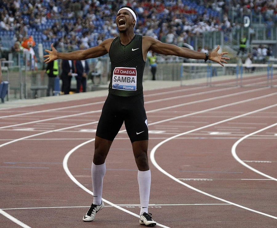 Qatar's Abderrahman Samba celebrates after winning the men's 400m hurdles during the Golden Gala in Rome on Thursday. He set an Asian record. AP/PTI