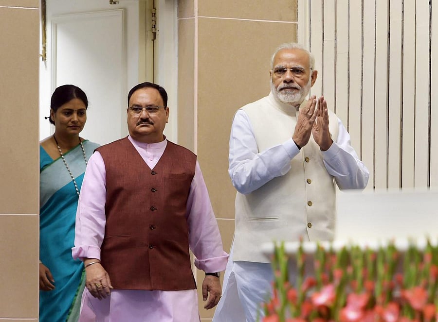 Prime Minister Narendra Modi with Health Minister JP Nadda. PTI file photo