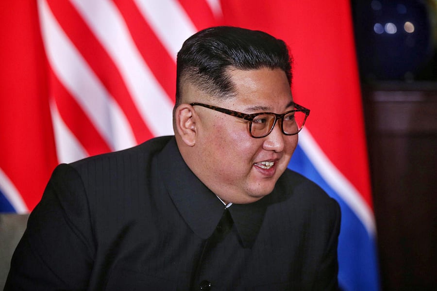 North Korean leader Kim Jong Un smiles next to U.S. President Donald Trump (not pictured) at the Capella Hotel on Sentosa island in Singapore June 12, 2018. (Kevin Lim/The Straits Times via REUTERS)