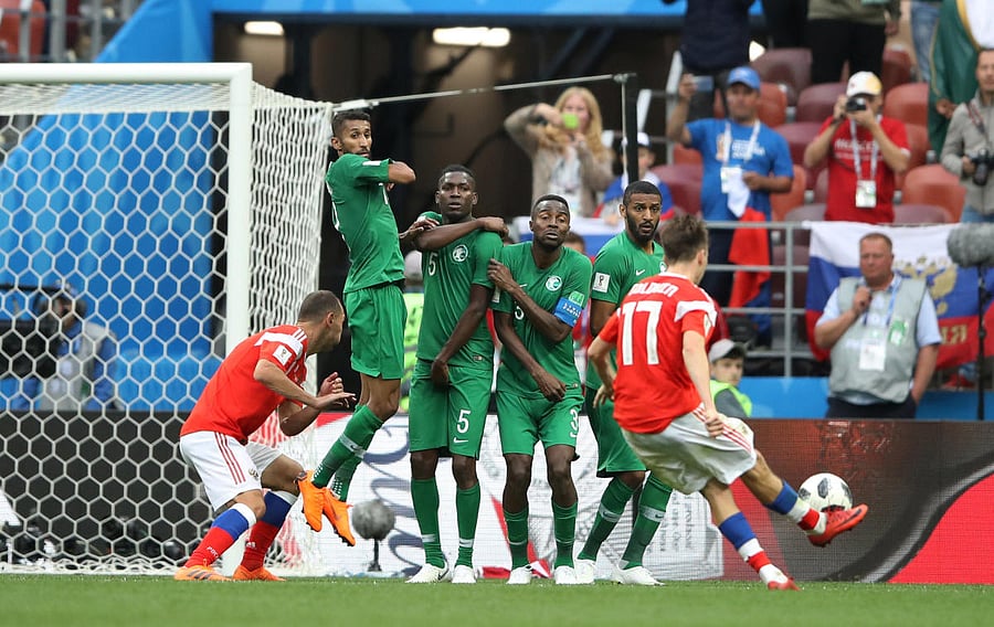 Russia's Aleksandr Golovin scores their fifth goal from a free kick. Reuters,