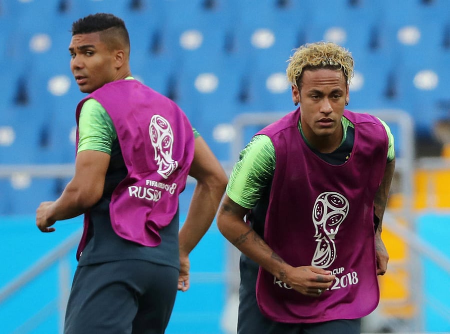 Brazil's Neymar with Casemiro during training REUTERS