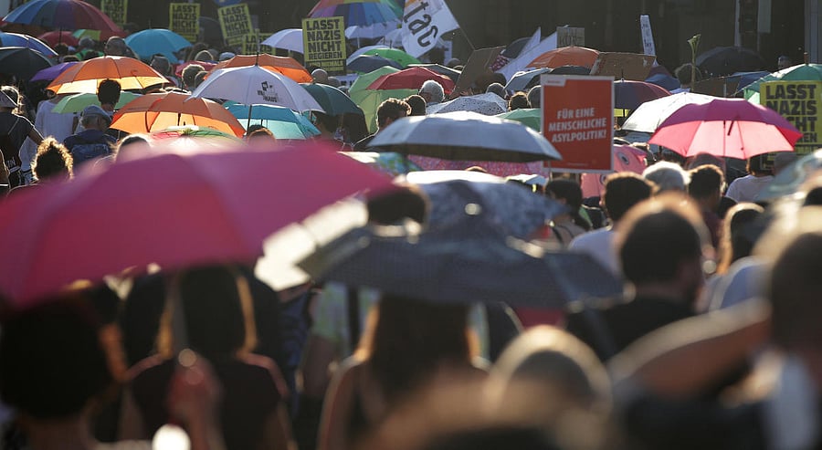 People take part in a rally to protest for the rights of asylum seekers on World Refugee Day in Vienna. Reuters photo