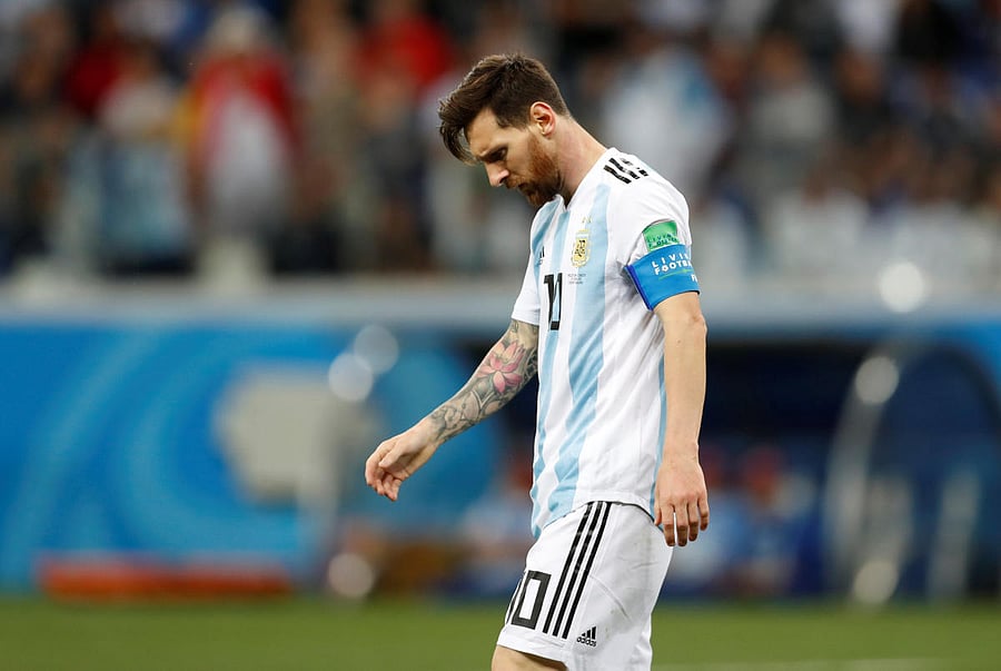 Argentina's Lionel Messi looks dejected after the match. REUTERS