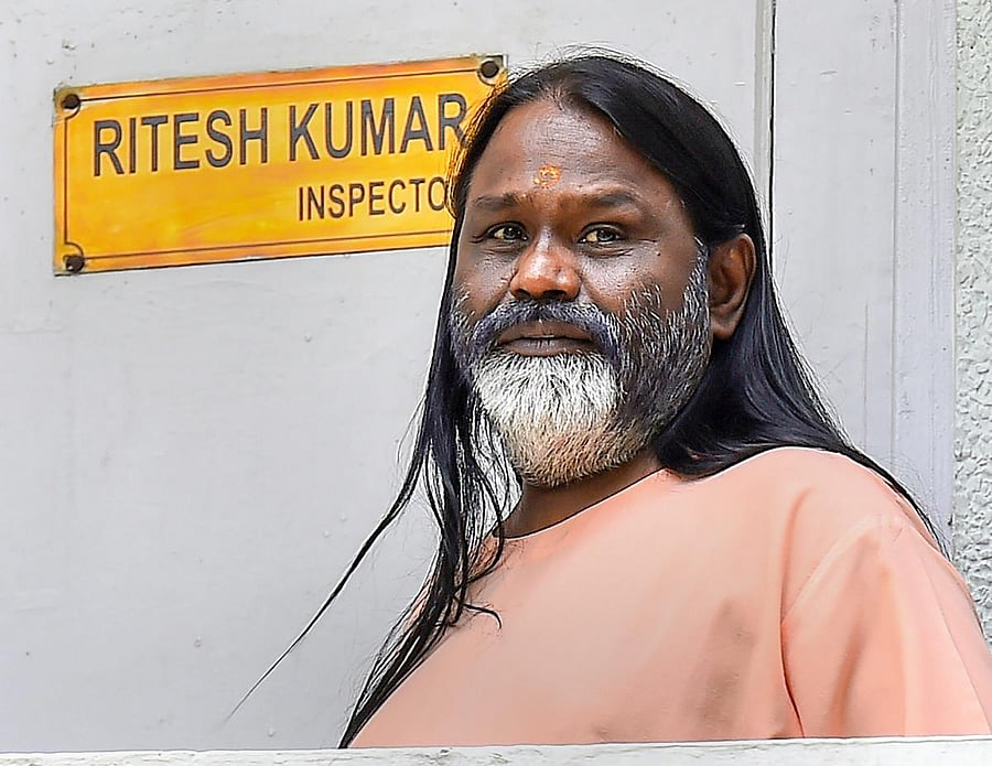 Daati Maharaj at Crime Branch office in Chanakyapuri, in connection with the rape case of a 25-year old woman, in New Delhi on Friday, June 22, 2018.(PTI Photo)