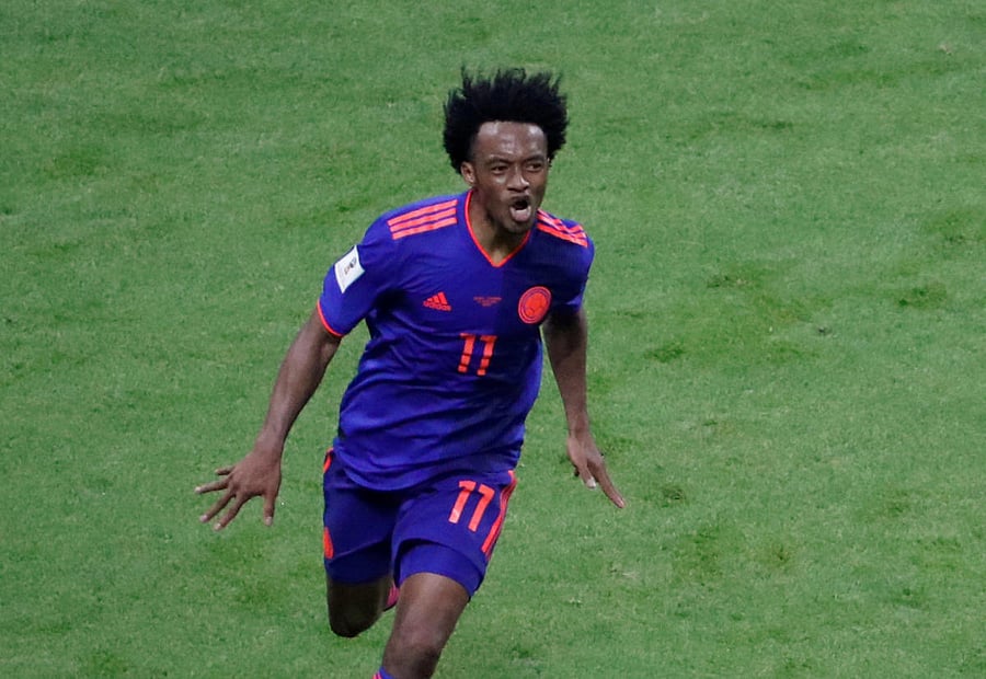 Colombia's Juan Cuadrado celebrates scoring their third goal. Reuters photo.