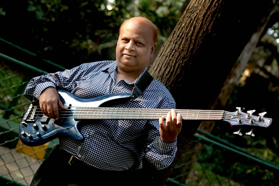 Bass guitar stalwart Caleb Alexander talks about how YouTube videos help him understand the pulse of younger musicians