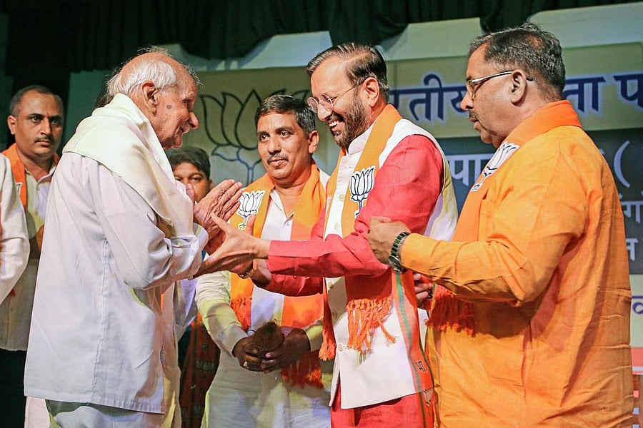 Human Resource Development Minister Prakash Javadekar felicitates the leaders who fought against the '1975 Emergency', in Jaipur on Tuesday. PTI