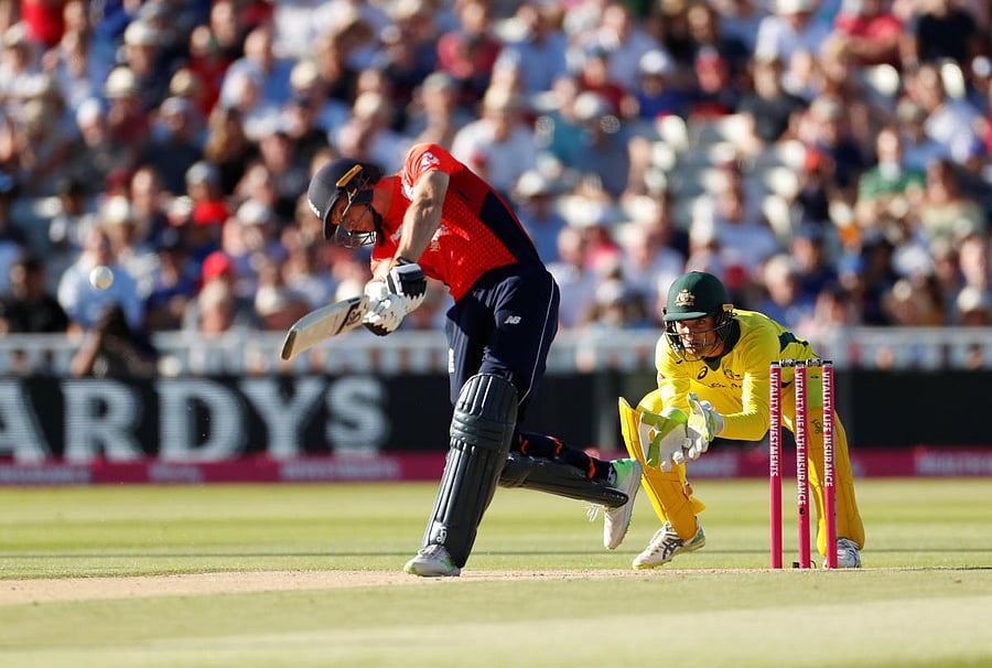 England’s Jos Buttler smashes one to the fence en route his 61 against Australia on Wednesday. Reuters