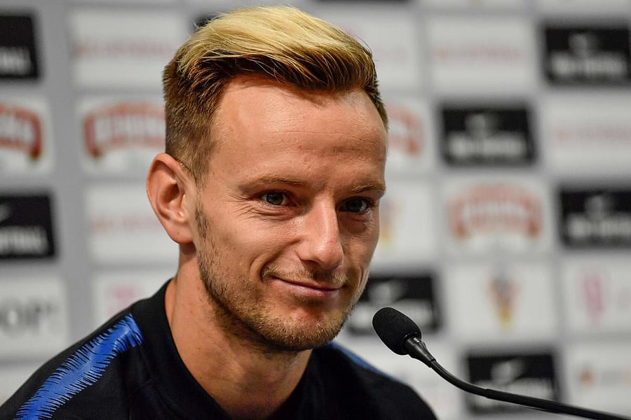 Croatia's Ivan Rakitic believes his team-mate Luka Modric is the best Croatian player in history. AFP