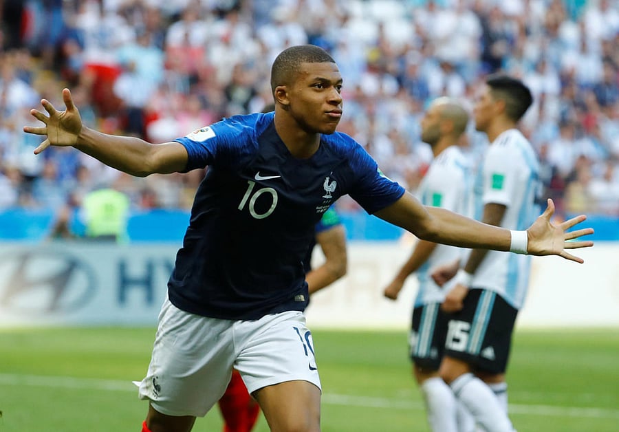 France's Kylian Mbappe celebrates scoring their third goal . Reuters photo