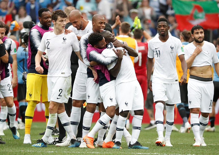 France's N'Golo Kante, Thomas Lemar and Djibril Sidibe celebrate after the match. Reuters photo