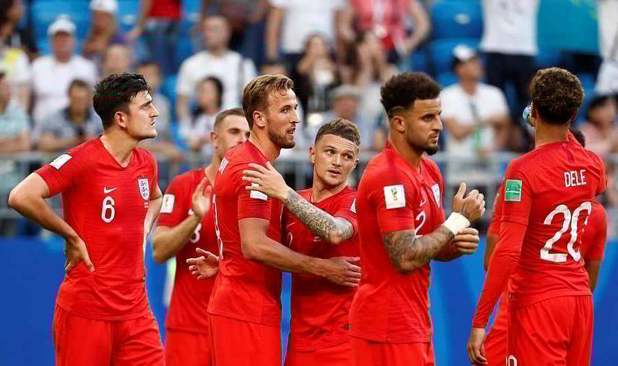  England players celebrate after the match. Reuters Photo