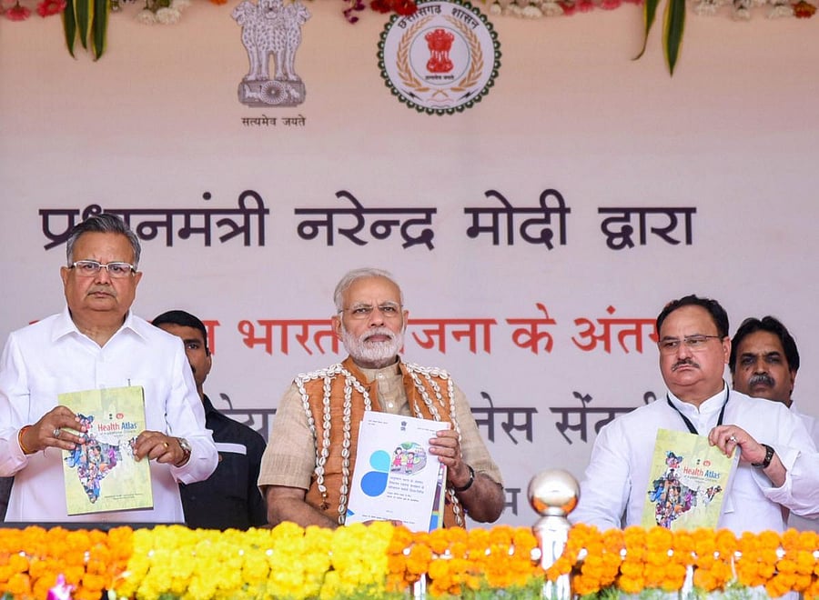 Prime Minister, Narendra Modi during the inauguration of the Health and Wellness Centre to mark the launch of Ayushman Bharat, in Bijapur, Chhatisgarh on Saturday. Chief Minister of Chhattisgarh, Raman Singh and the Union Minister for Health &amp; Family