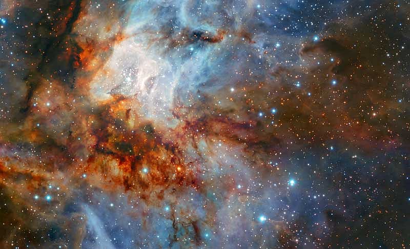Dust-shrouded star cluster spotted