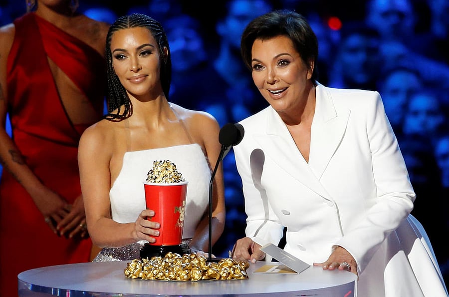 Reality stars Kim Kardashian (L) and Kris Jenner accept the award for Best Reality Series or Franchise at the 2018 MTV Movie & TV Awards at Barker Hangar in Santa Monica, California, U.S., June 16, 2018. Picture taken June 16, 2018. REUTERS/Mario Anzu