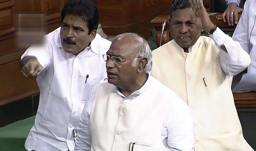 Congress Parliamentary Party leader Mallikarjun Kharge speaks during the first day of the Monsoon session of Lok Sabha. PTI file photo.
