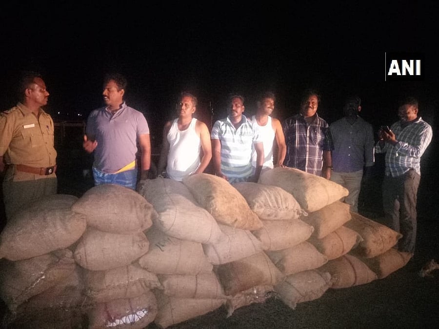 Police with the seized sea cucumber off the Tamil Nadu coast. ANI/Twitter photo.