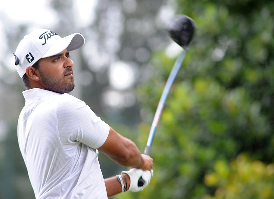 Fine Rally: India’s Khalin Joshi in action on the third day of the Take Solutions Masters Golf tournament at the KGA course on Saturday. DH Photo/ Srikanta Sharma R