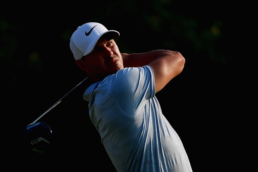 Brooks Koepka of the United States plays his shot from the 18th tee during the third round of the PGA Championship on Saturday. AFP