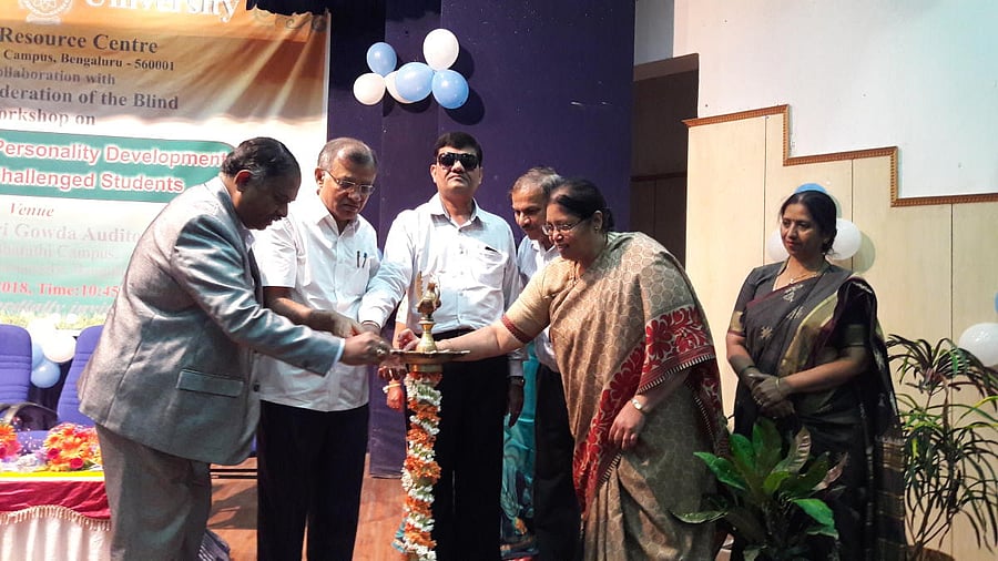 (from right to left) Bangalore University registrar B K Ravi; vice-chancellor Venugopal K R; Gautam Agarwal, general secretary, National Federation of the Blind; Professor I R N Gouder; Dr Ismath Afshan, director, Braille Resource Centre; and Professor La