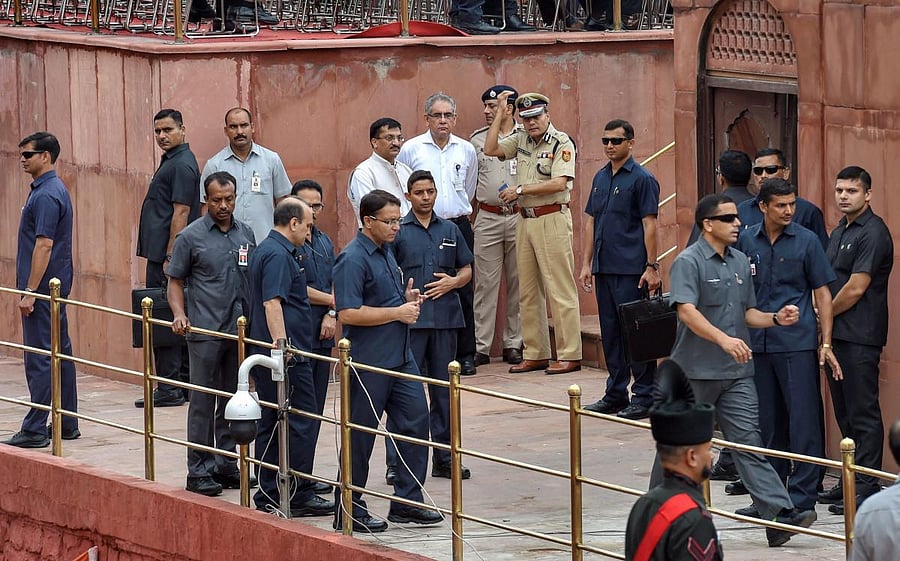Security personnel keep vigil during the full dress rehearsal of the 72nd Independence Day function at the historic Red Fort in New Delhi. PTI Photo