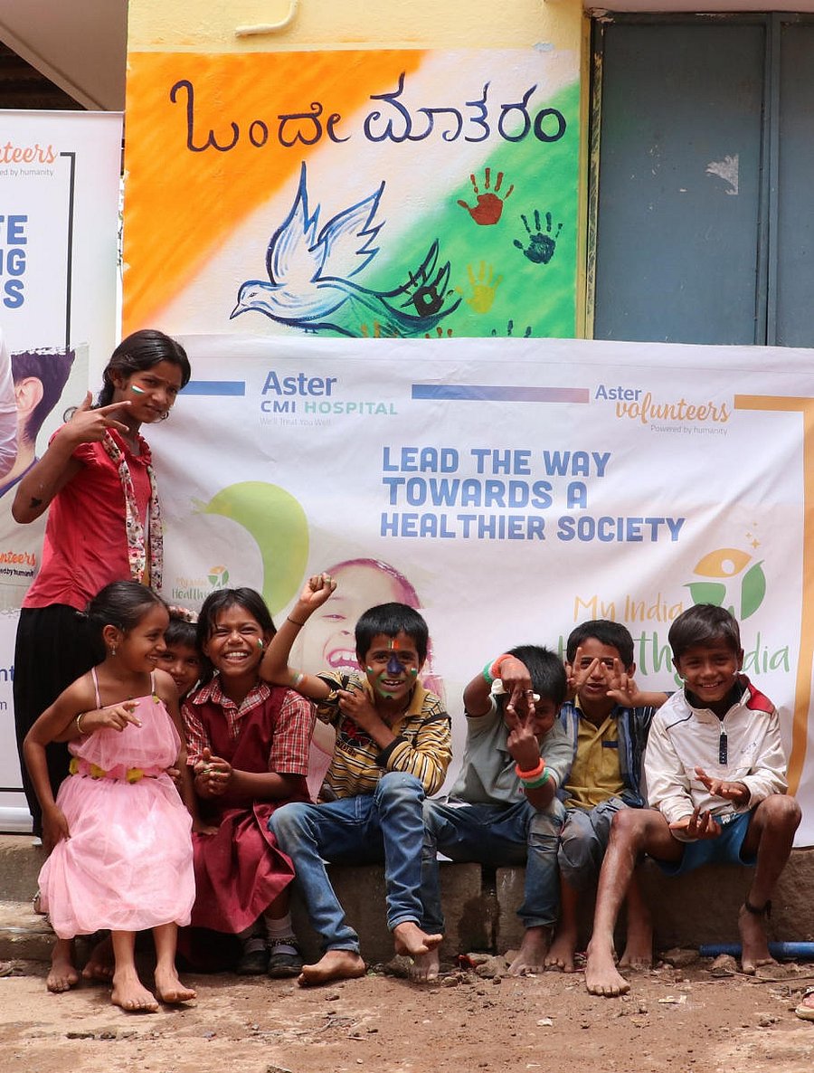 Students outside the school's refurbished wall in Hebbal on Wednesday.