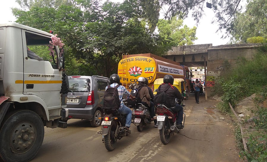 Corporator Pushpa Manjunath had promised to ban water tankers during peak hours on Panathur-Belagere Road as they were causing traffic snarls. DH FILE PHOTO