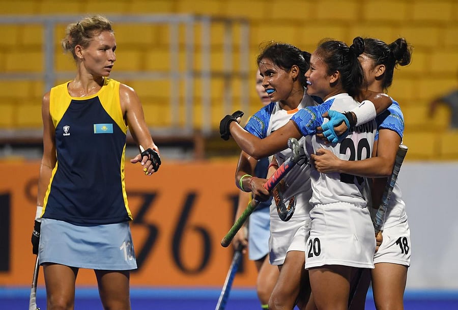 Indian players celebrate after scoring against Kazakhstan in their pool B match at the Asian Games in Jakarta on Tuesday. AFP
