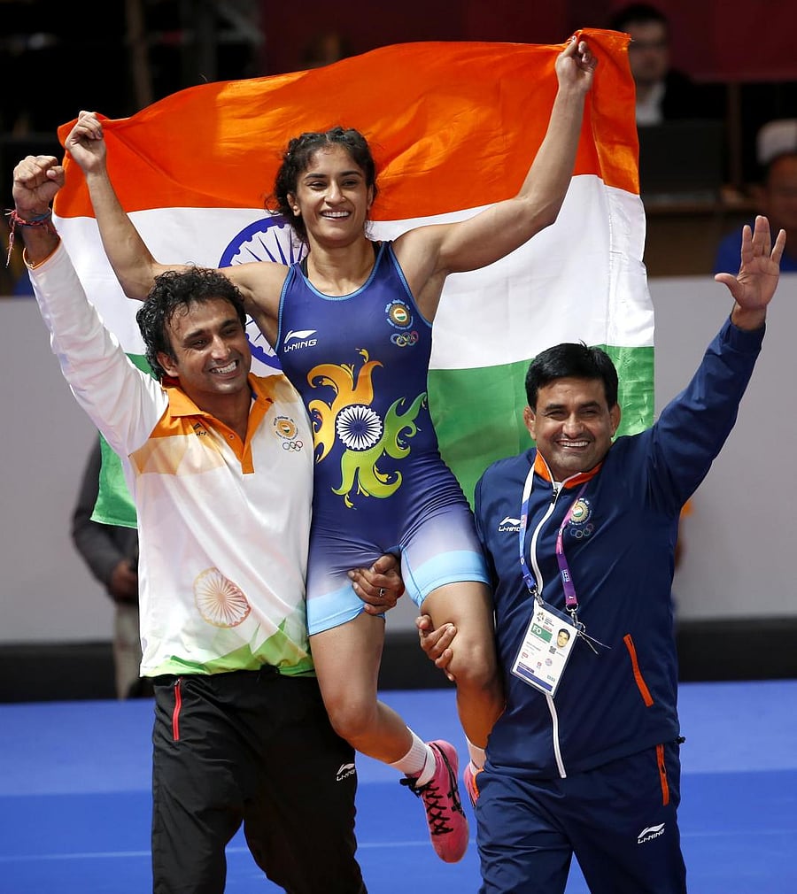 Vinesh Phogat celebrates after winning gold medal in 50kg category. REUTERS