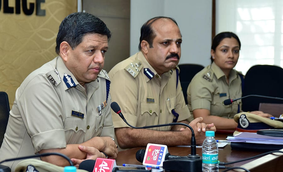 Karnataka Additional Director General of Police Kamal Pant interacts with reporters at Mangaluru City Police Commissionerate office on Thursday. Commissioner of Police T R Suresh and DCP (Crime and Traffic) Uma Prashanth look on.