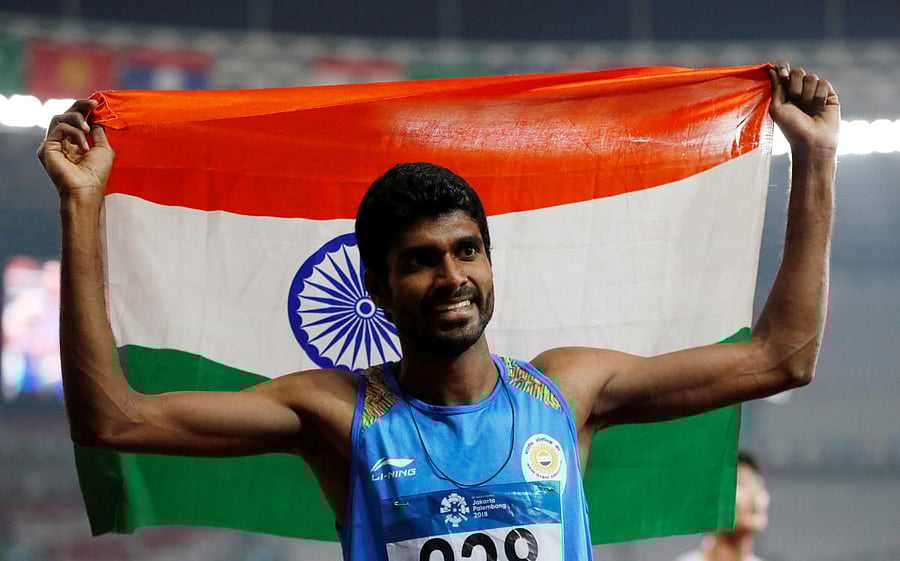 India's Jinson Johnson celebrates after the race. (Reuters Photo)