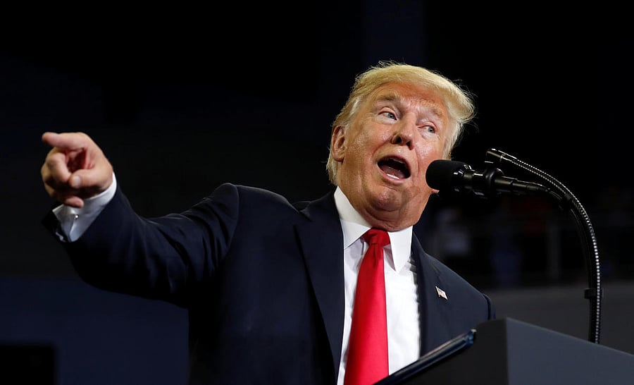 US President Donald Trump speaks during a "Make America Great Again" rally in Evansville, Indiana, August 30, 2018. (REUTERS)