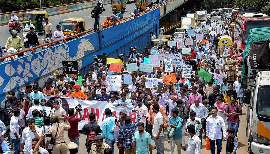 Actor Prakash Raj with Kavita Lankesh, sister of slain journalist Gauri Lankesh and other activists during Gauri Day, to commemorate one-year since assassination, in Bengaluru, Wednesday, Sept 5, 2018. (PTI Photo)