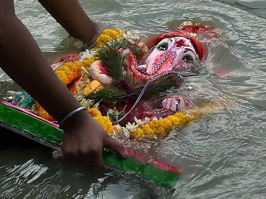  Volunteers from Environmentalist Foundation of India are gearing up to clean three lakes after the Ganesha festival. PTI file photo