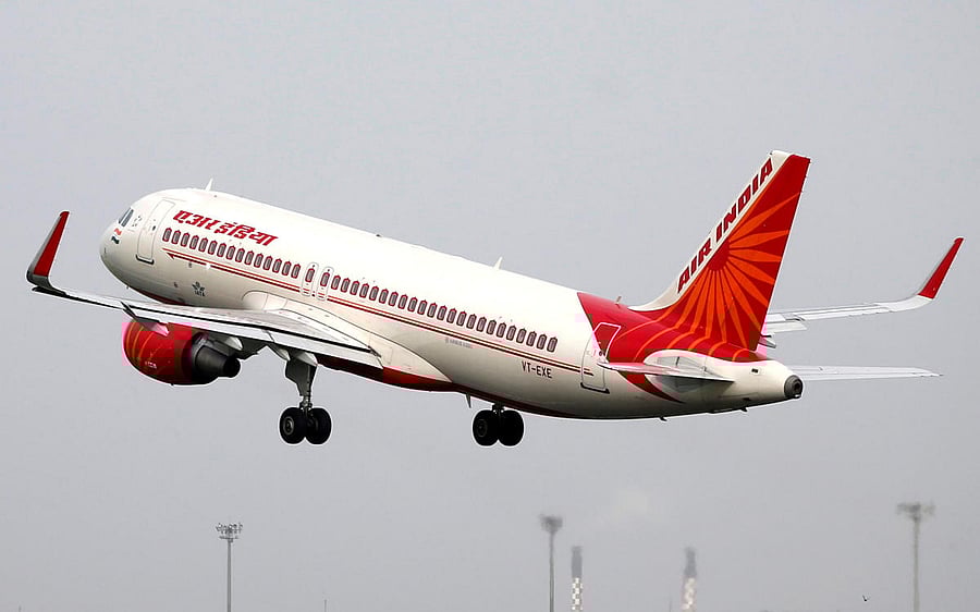 FILE PHOTO: An Air India aircraft takes off from the Sardar Vallabhbhai Patel International Airport in Ahmedabad, India, July 7, 2017. REUTERS/Amit Dave/File Photo