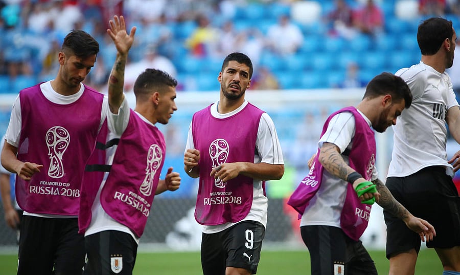 Uruguay vs Russia - Samara Arena, Samara, Russia - June 25, 2018 Uruguay's Luis Suarez and teammates during the warm up before the match REUTERS