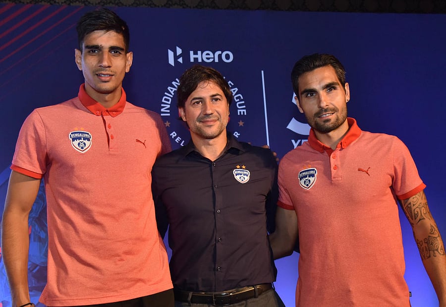 Bengaluru FC goalkeeper Gurpreet Singh Sandhu, coach Carles Cuadrat and striker Dimas Delgado at the launch of 5th edition of the Indian Super League in Bengaluru on Thursday. DH photo/ Janardhan B K. 