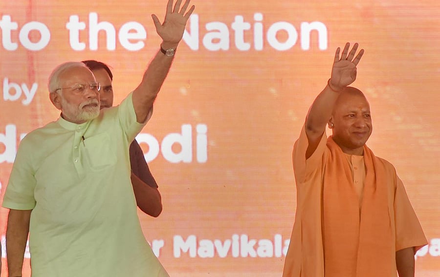 Prime Minister Narendra Modi with Uttar Pradesh Chief Minister Yogi Adityanath during the inauguration of 135km long Eastern Peripheral Expressway (NH-II) connecting Kundli to Palwal, at Bagpat, in Uttar Pradesh, on Sunday. PTI photo