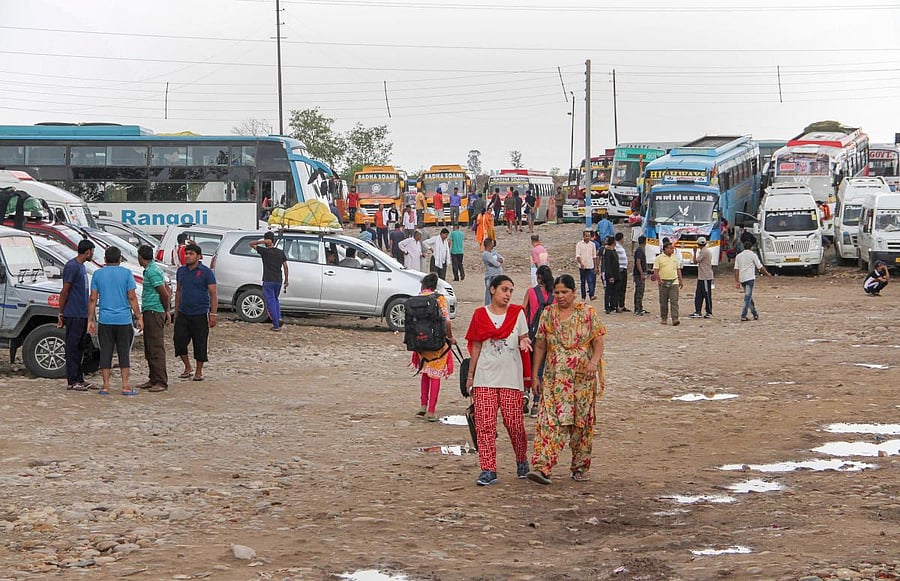 Vehicles of Amaranth pilgrims parked at a base camp as the yatra has been stopped due to bad weather conditions, in Jammu. (PTI File Photo)