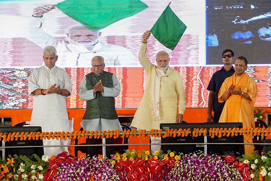 Prime minister Narendra Modi with Uttar Pradesh Governor Ram Naik, Chief Minister Yogi Adityanath and others during a public meet, at Rajatalab in Varanasi on Saturday, July 14, 2018. (PTI Photo)