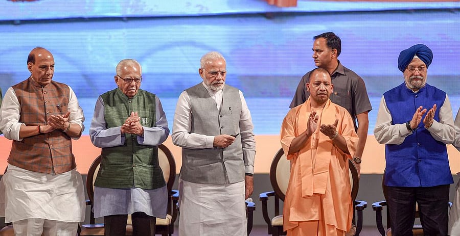 Prime Minister Narendra Modi with Uttar Pradesh Governor Ram Naik, Chief Minister Yogi Adityanath and Union Home Minister Rajnath Singh inaugurate various projects, in Lucknow on Saturday. PTI