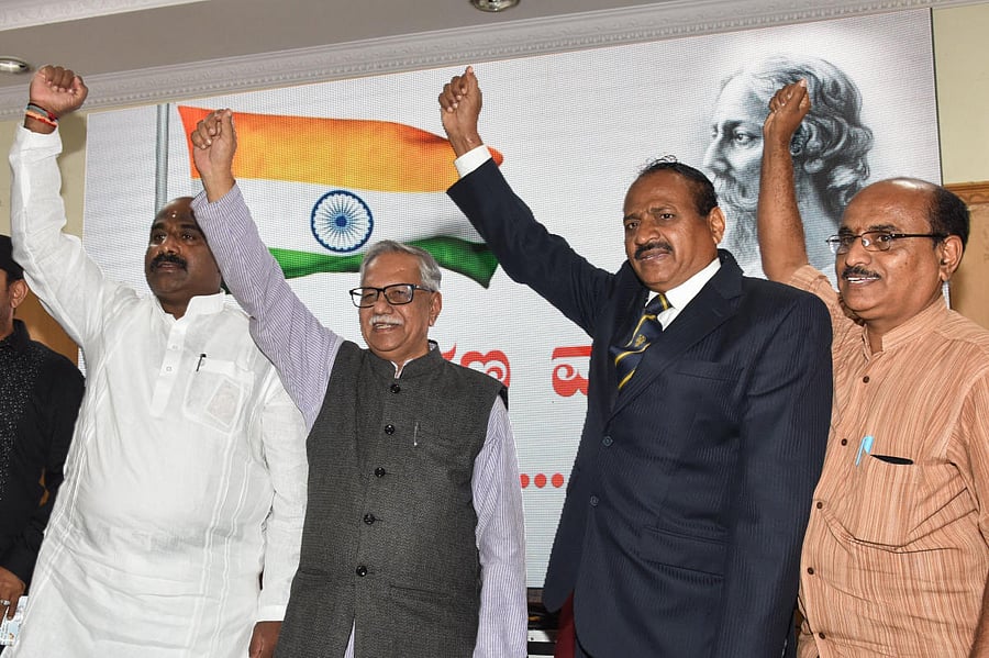 Shashank Raj, film director, V Lokesh Gowda, President, Rashtrageete Jagruthi Abiyana Samitte, Doddarangegowda, Litterateur, SB Chabbi Retd ACP and Lakshmi Srinivas, writer are seen at the press meet regarding National Anthem awareness programme held on 1