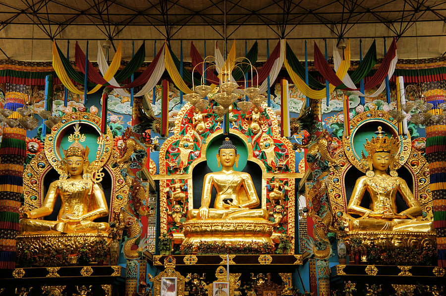 Statues of Guru Rinpoche, Lord Buddha and Buddha Amitayus in Namdroling Monastery, Bylakuppe